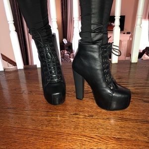 NWOT. Black leather combat heeled boots